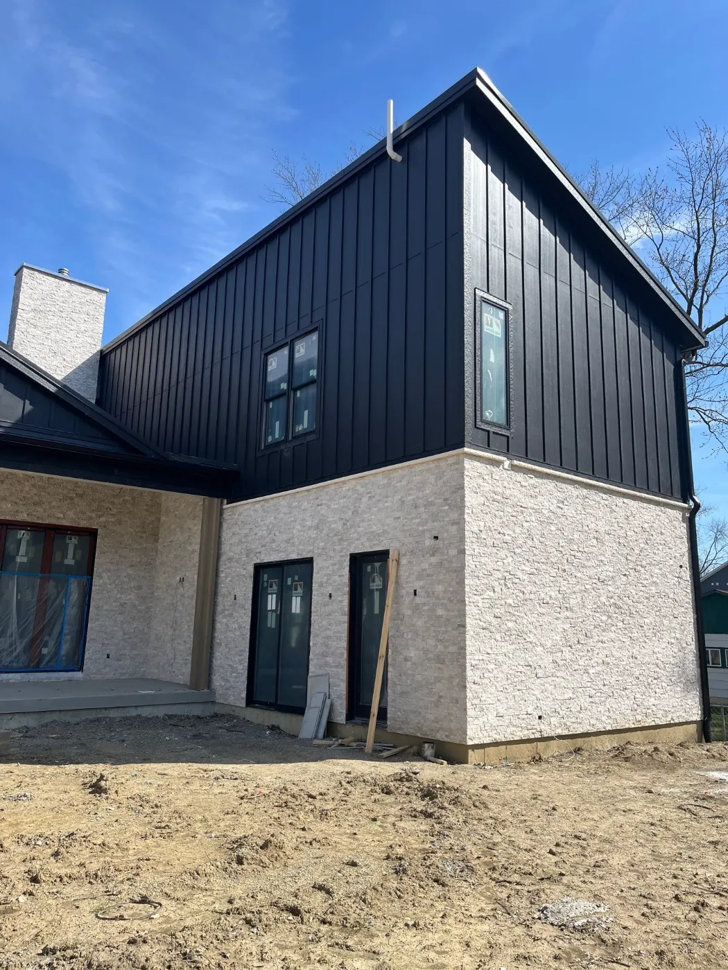 Siding installation documented in Providence Green